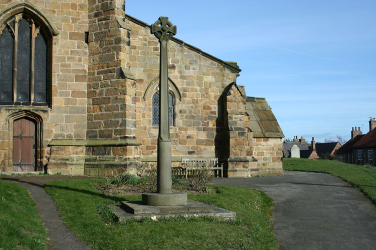 The Memorial Cross outside the Church of St. Helen, Ainderby Steeple