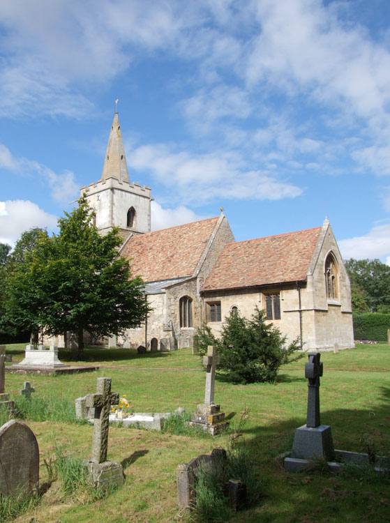 St. Peter's Church, Coton (Cambridgeshire). The War Memorial can be seen on the left of the photo.