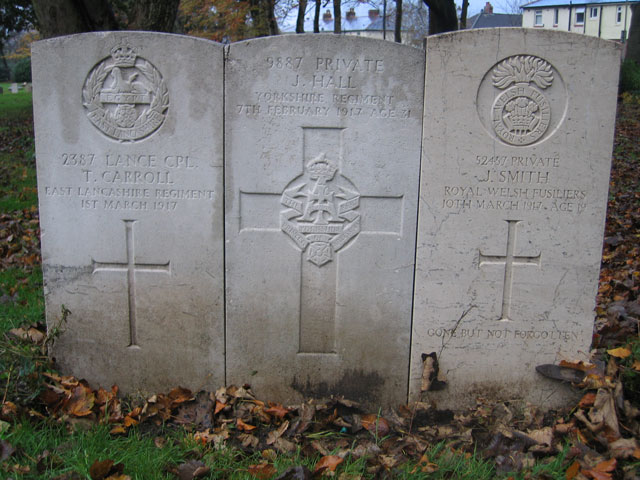 Private Hall's grave in the group of three.
