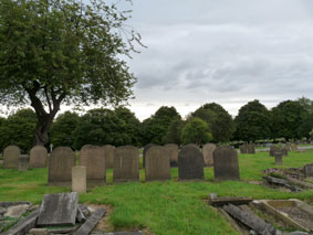 Behind the CWGC headstone for Private Gill (on the right) is a "family" headstone with his name on it.