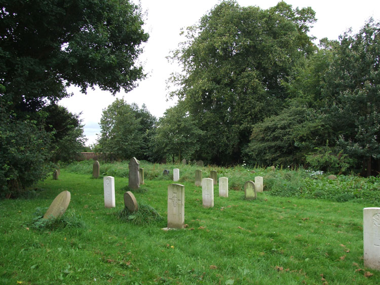 Private Hartley's headstone (centre) in York Cemetery