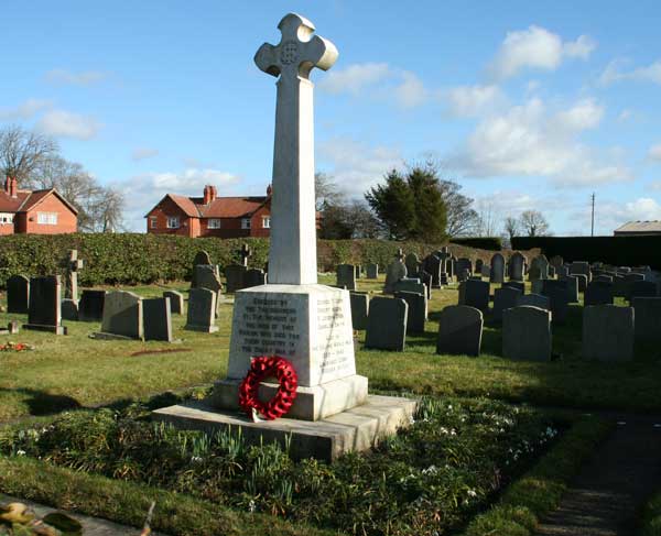 The War Memorial for Harome, located in the village cemetery. 