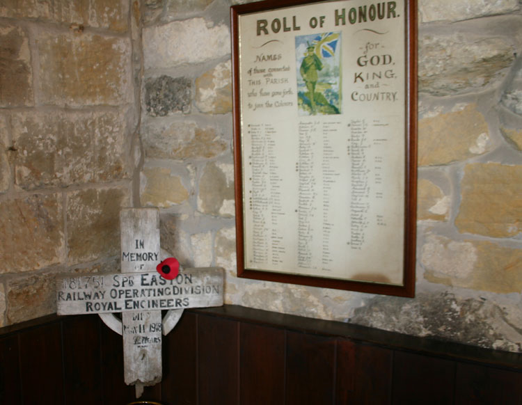 Sapper Easton's Battlefield Cross beside the Roll of Honour in St. Nicholas' Church.