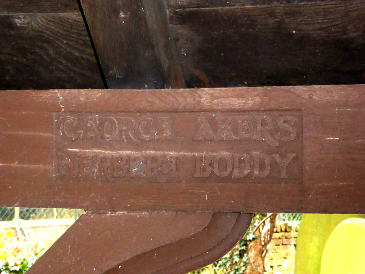 Photo showing Commemorated Names Carved Inside the Lych Gate (Detail)