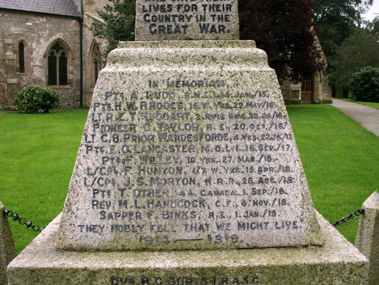 The War Memorial outside St. Michael's Church, Kirklington.