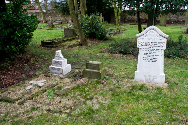 The family headstones for Privates Walter Nice and Thomas Taylor, and Stoker John Young in Langley Park (All Saints') Churchyard