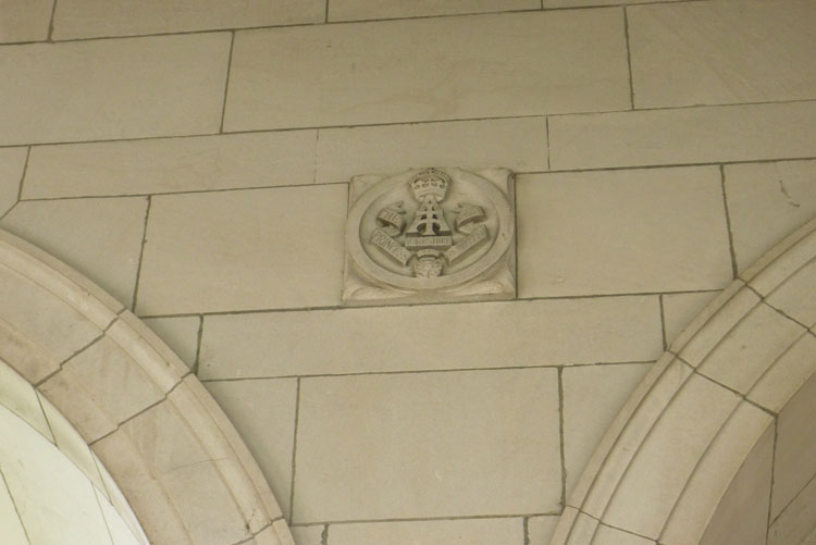 The Yorkshire Regiment Cap Badge on the Le Touret Memorial