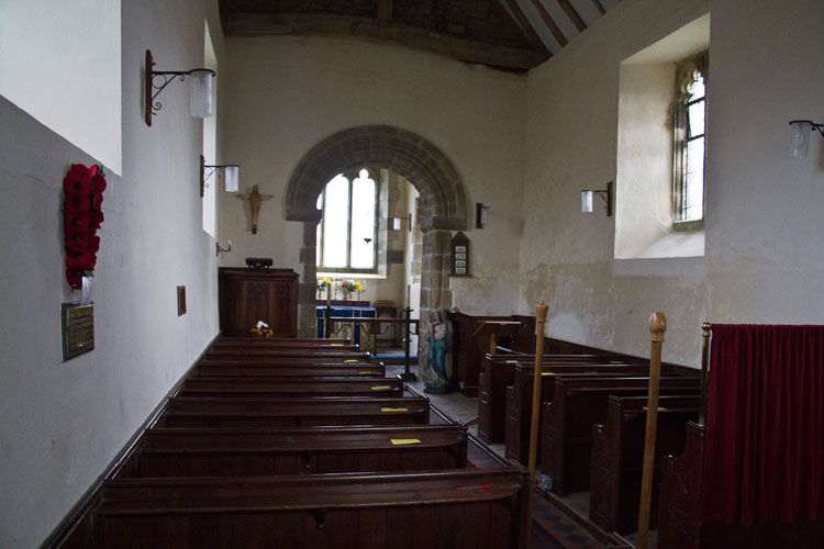 The Interior of All Saints' Church, showing the War Memorial on the left