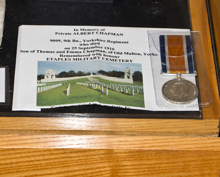 Private Chapman's British Medal on Display in a Case in St. Mary's Church, Old Malton