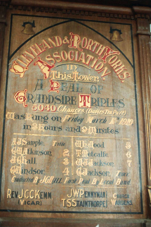 A Board in the bell tower recording a peal of Grandsire Triples rung on March 11, 1910. The first name on the list of ringers is (26614 Pte) AJ (Alfred James) Sample, KIA 2.4.1917.