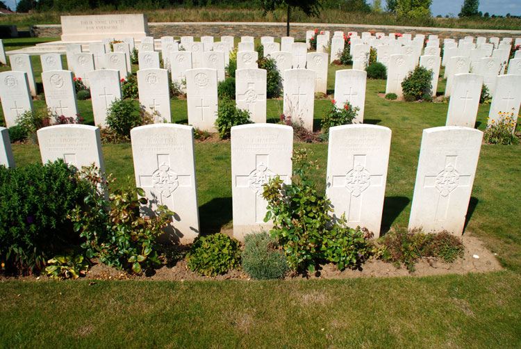 The Adjoining Graves of Thompson, Bell, Harris, Addison and Finn in Assevillers New British Cemetery.