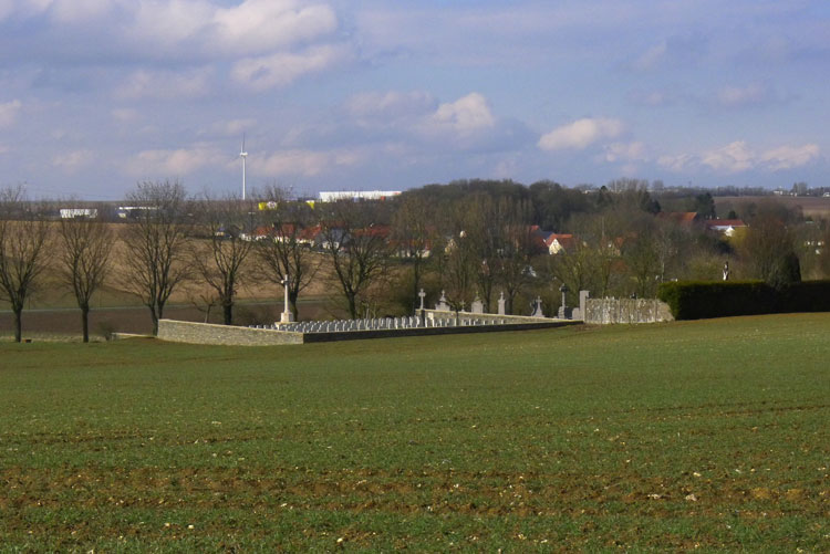 A view of the Heninel Communal Cemetery Extension, showing the Cross of Sacrifice.