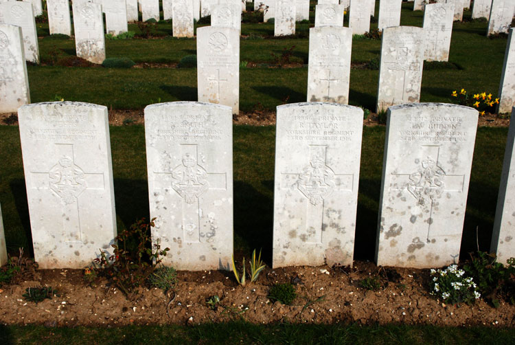 Ovillers Military Cemetery, Somme, - the graves (l to r) of Ptes Jeffs, Smith, Taylor & Buddin 