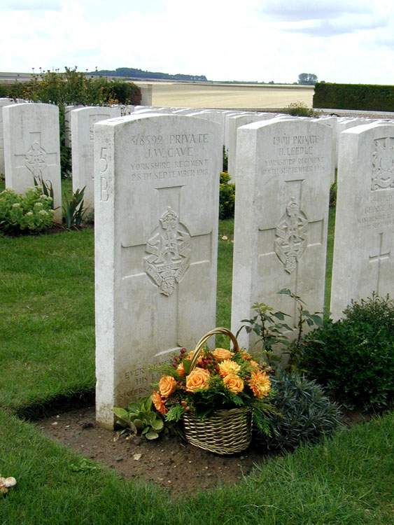 The headstones for Privates Cave and Leedle, with Private Robinson's headstone left rear.