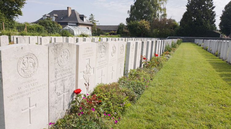 Thomas Ridsdale's Headstone in Vermelles British Cemetery (Third from the left)