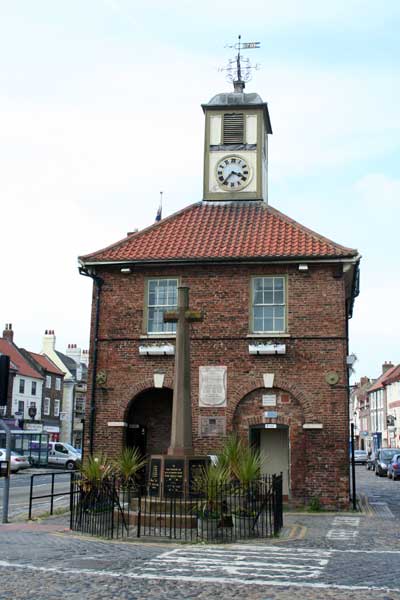 The Memorial Cross outside the old Town Hall in Yarm High Street.