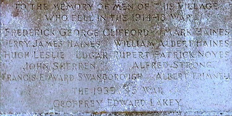 The War Memorial for Poulshot (Wiltshire), on the outside wall of St. Peter's Church 