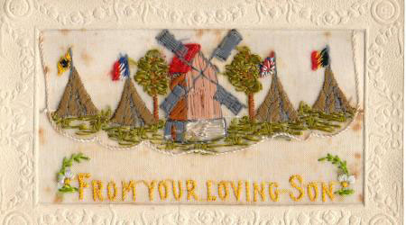 The silk front of the card lifted up and the above small card was tucked inside.