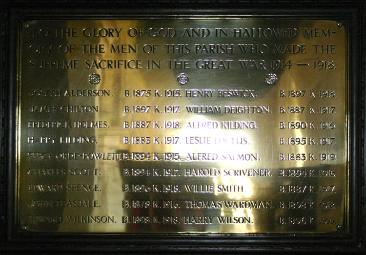 The brass memorial plaque in the Church of the Holy Trinity, Wensley. 