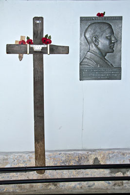Alongside the plaque to Robert Pulleine is the Battle Cross which marked his original place of burial.