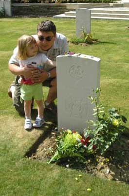 Glenn Stone and his daughter Emilia visiting William Short's grave on the 90th Anniversary of William Short's death.